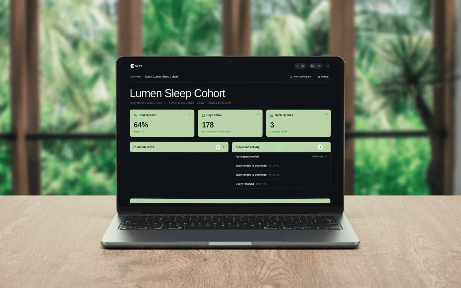 The NeuroJournal researcher dashboard on a laptop